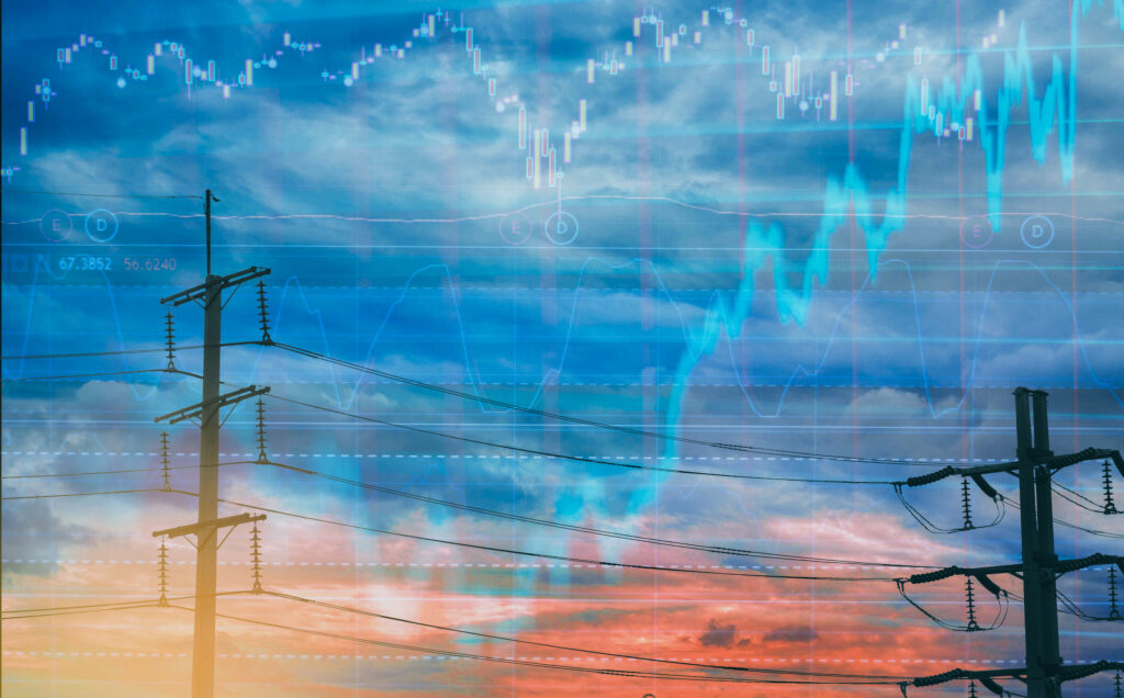 Electric pole, and colorful sky stock chart as background. With the concept of volatility of stocks and energy businesses in the global market.